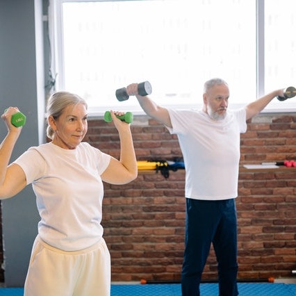 elederly couple exercising