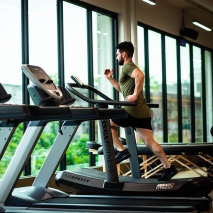 man runs on treadmill